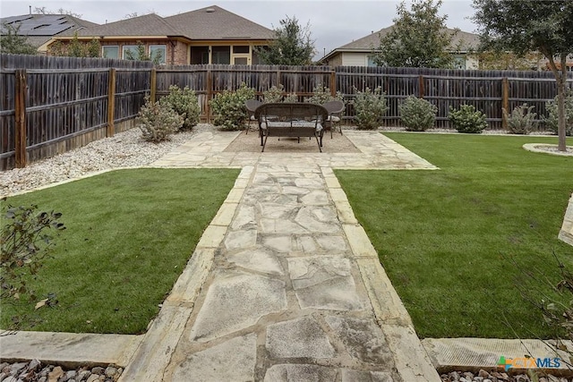 view of yard with a patio area