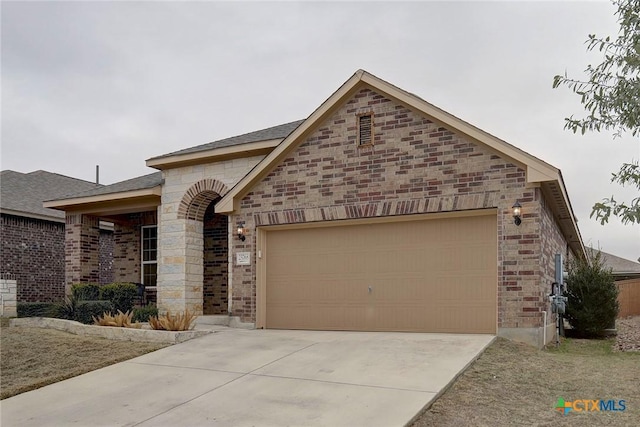 view of front of property with a garage