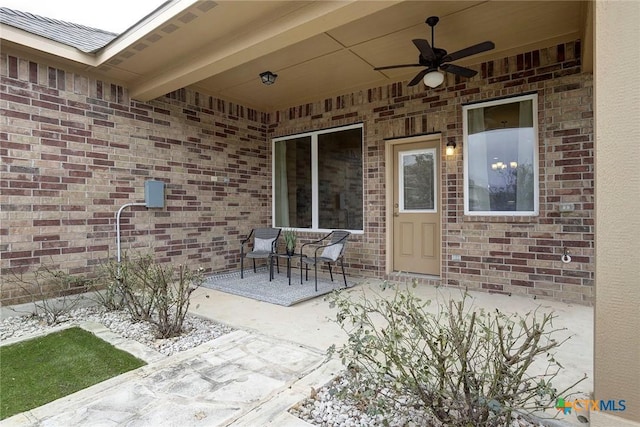 view of patio / terrace featuring ceiling fan