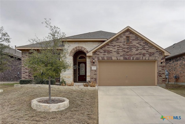 view of front of home with a garage