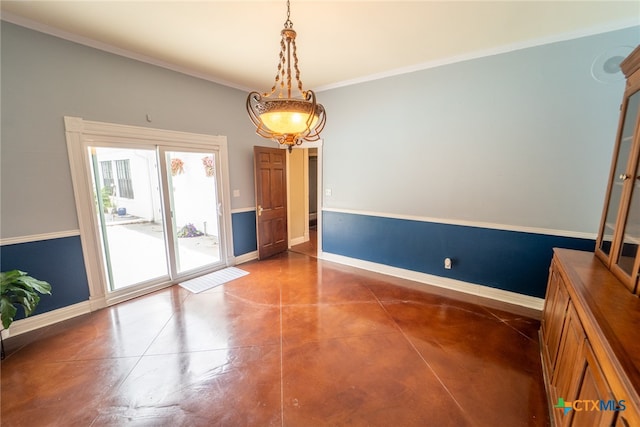 unfurnished dining area with crown molding