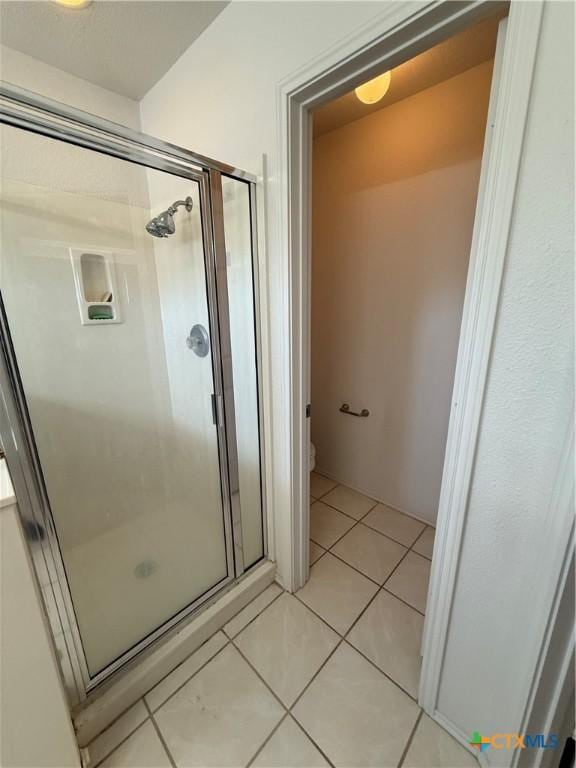 3054 Colorado Dr, Copperas Cove, TX 76522 - bathroom featuring a stall shower and tile patterned floors