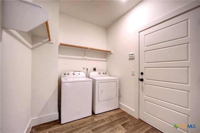 clothes washing area featuring washing machine and dryer