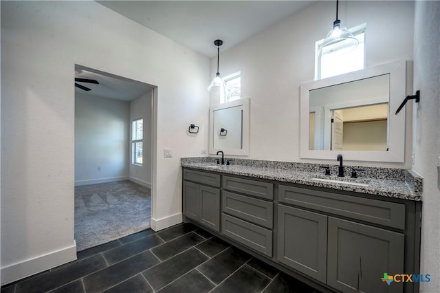 bathroom with vanity, tile patterned floors, and ceiling fan