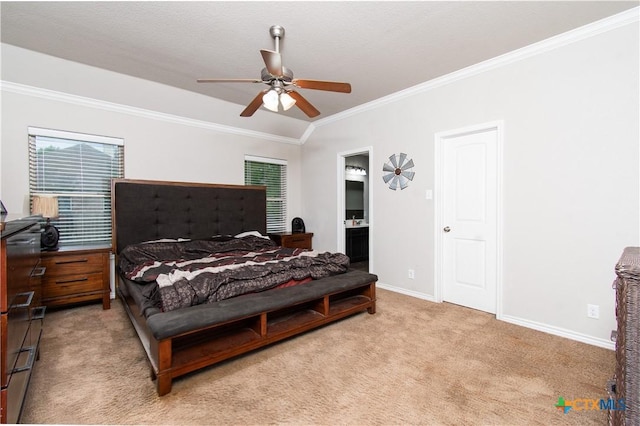 bedroom with baseboards, ornamental molding, ensuite bath, ceiling fan, and light carpet