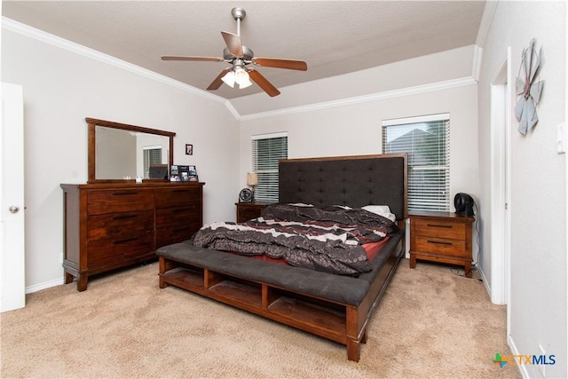 bedroom with crown molding, carpet flooring, baseboards, and a ceiling fan
