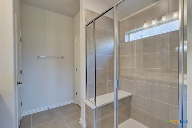 bathroom featuring tile patterned floors and walk in shower