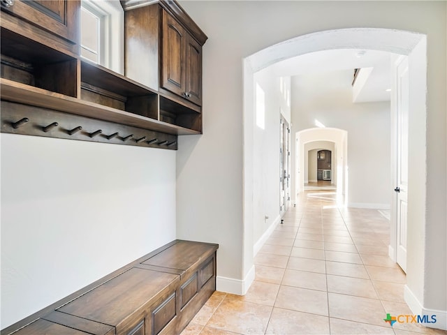 mudroom featuring light tile patterned floors