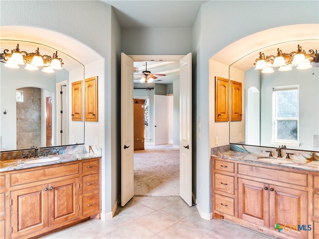 bathroom with vanity, tile patterned flooring, and ceiling fan