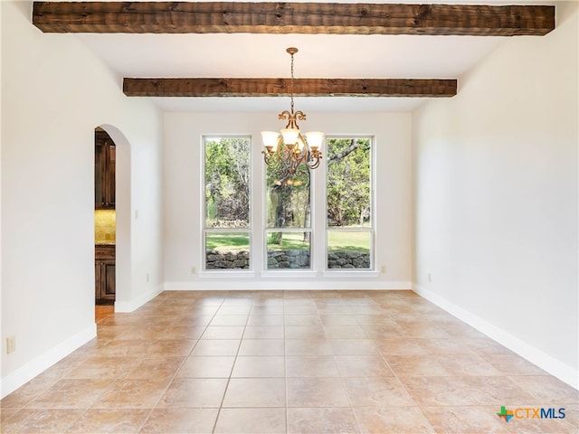 tiled spare room featuring beamed ceiling and an inviting chandelier