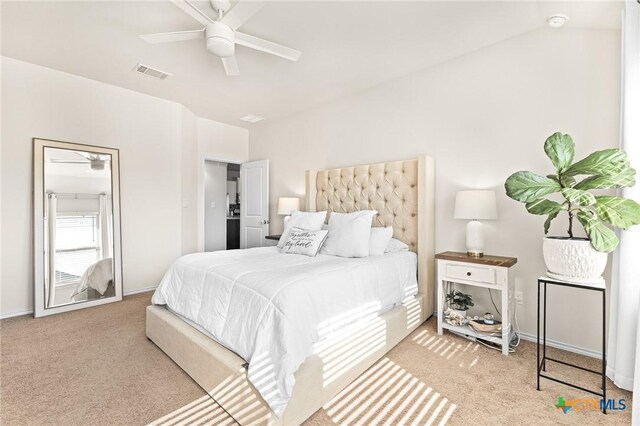 carpeted bedroom with ceiling fan