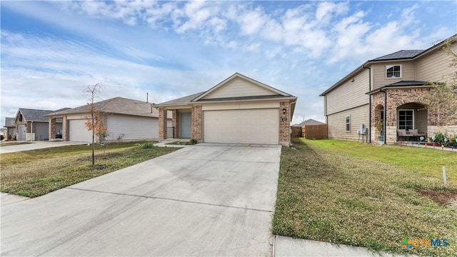 view of front of house with a garage and a front yard