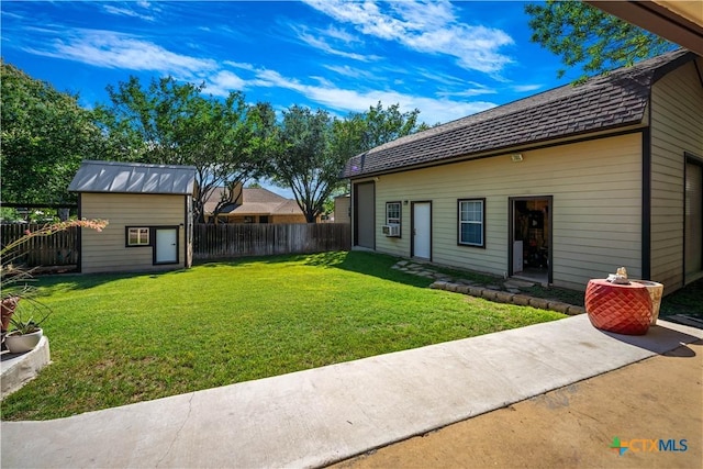 103 River Mdw, Castroville, TX 78009 - view of yard with an outdoor structure, cooling unit, and a storage shed