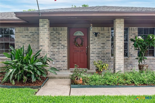 1617 Avalon St, Port Lavaca, TX 77979 - entrance to property with brick siding and roof with shingles