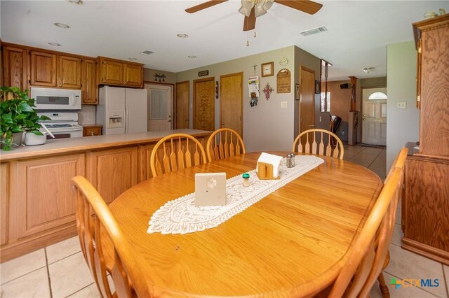 1617 Avalon St, Port Lavaca, TX 77979 - dining room featuring ceiling fan and light tile patterned floors