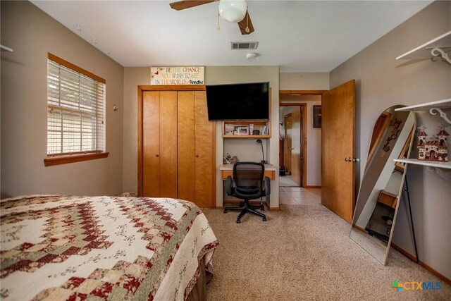 1617 Avalon St, Port Lavaca, TX 77979 - bedroom with light carpet, a closet, and ceiling fan