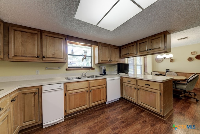 kitchen with kitchen peninsula, dark hardwood / wood-style floors, a textured ceiling, and dishwasher