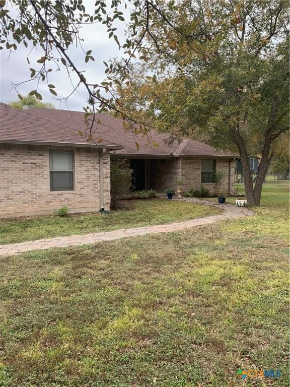 exterior space with a lawn