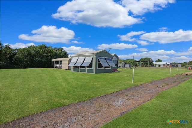 exterior space featuring a yard