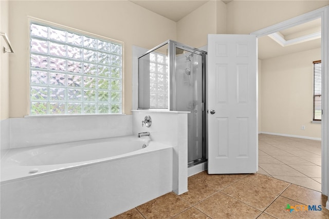 bathroom featuring tile patterned floors and plus walk in shower