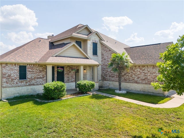 view of front of property with a front yard