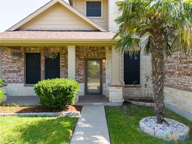 property entrance with covered porch