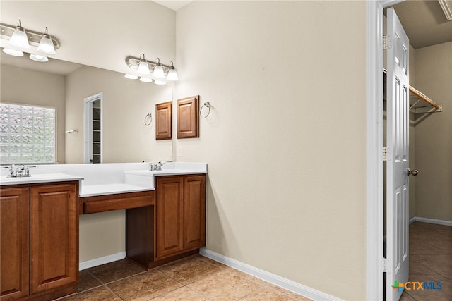 bathroom featuring tile patterned floors and vanity