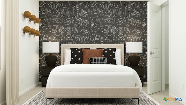 carpeted bedroom featuring baseboards