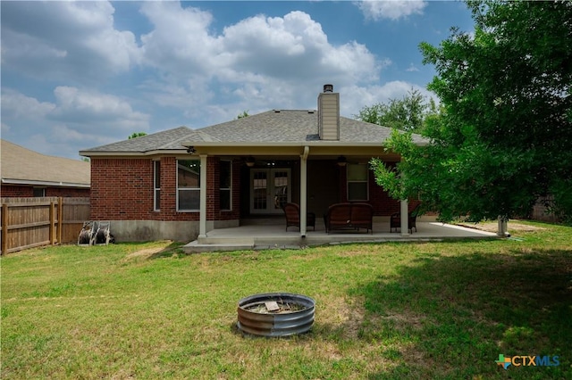 1764 Lower Forty, New Braunfels, TX 78130 - back of house featuring french doors, ceiling fan, a patio area, a chimney, and brick siding
