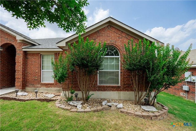 1764 Lower Forty, New Braunfels, TX 78130 - view of home's exterior featuring brick siding and a yard