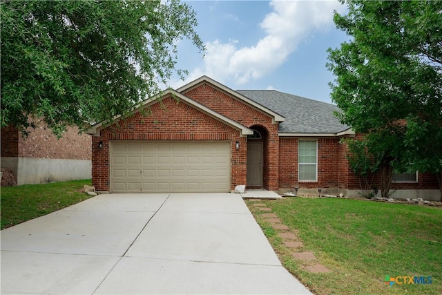 1764 Lower Forty, New Braunfels, TX 78130 - view of front of property featuring a garage, brick siding, a front yard, driveway, and roof with shingles