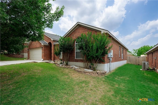 1764 Lower Forty, New Braunfels, TX 78130 - view of front of property with brick siding, driveway, an attached garage, and central AC
