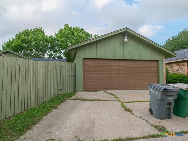 detached garage with fence