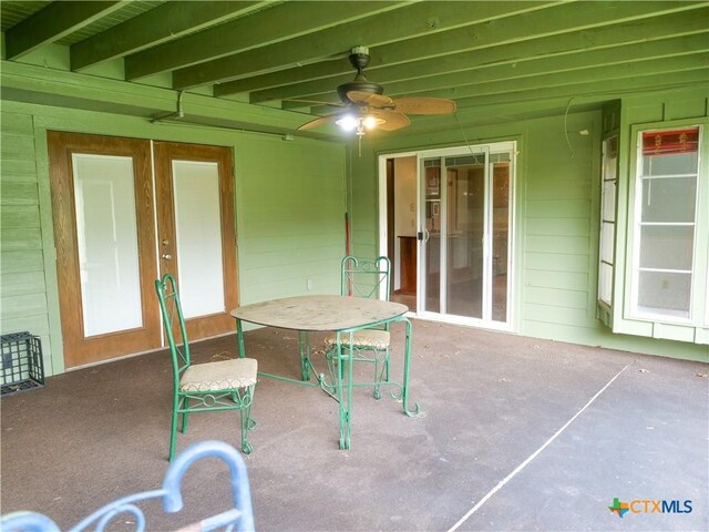 view of patio / terrace featuring a ceiling fan and outdoor dining space