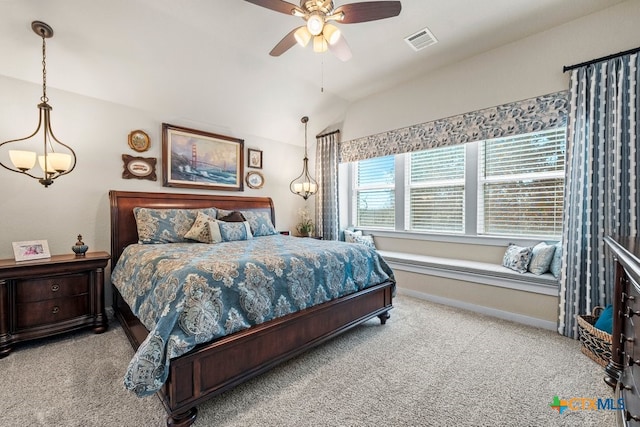 carpeted bedroom featuring visible vents, ceiling fan, baseboards, and lofted ceiling