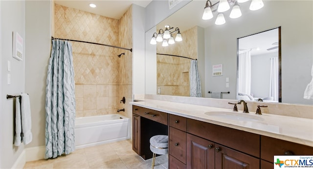 bathroom featuring shower / tub combo, vanity, and tile patterned floors