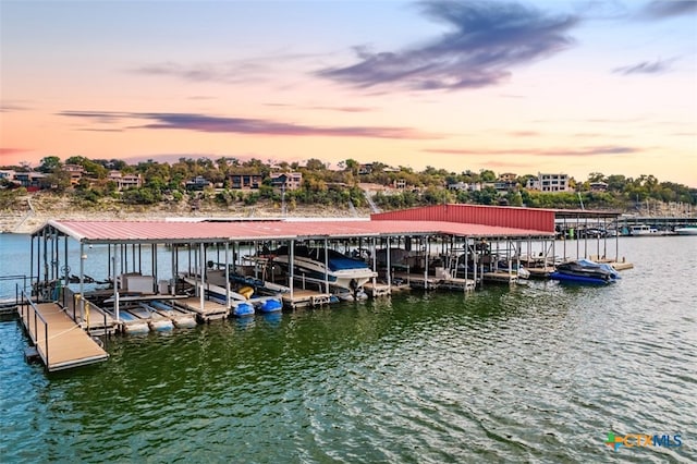 view of dock with a water view