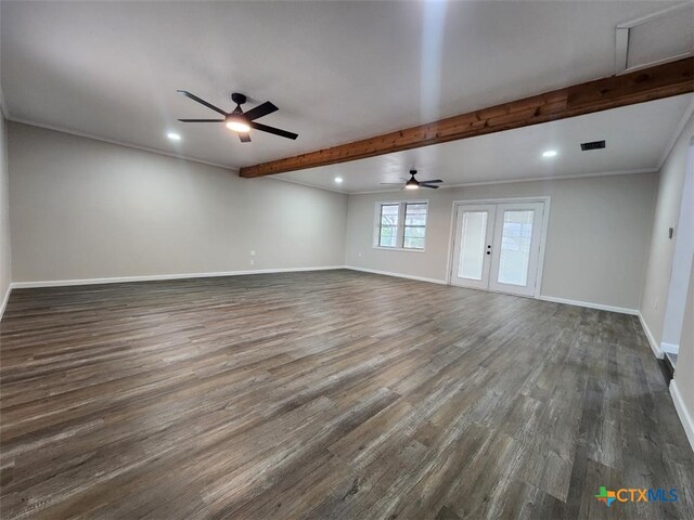 empty room featuring dark wood-style flooring, french doors, baseboards, and beam ceiling