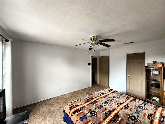 1402 Fox Creek Dr, Killeen, TX 76543 - bedroom with visible vents, baseboards, carpet floors, and ceiling fan