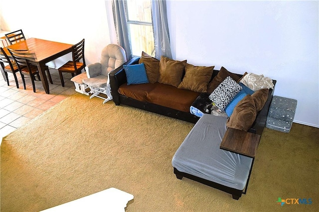 tiled living area with carpet