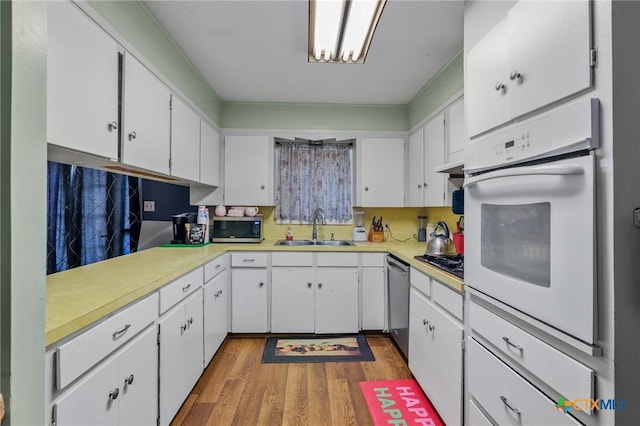 kitchen with sink and white cabinets