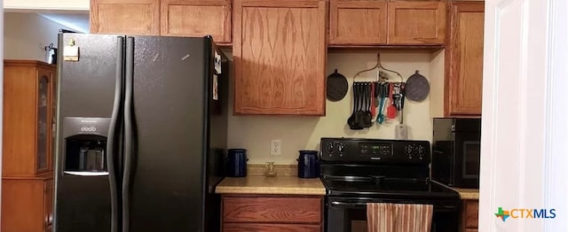 kitchen with black appliances