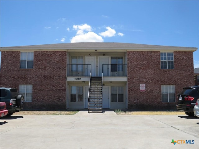 view of property with stairway