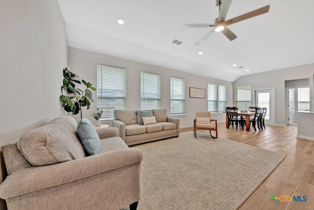 123 Paul Pena Dr, San Marcos, TX 78666 - living area featuring lofted ceiling, light wood-style floors, ceiling fan, recessed lighting, and baseboards