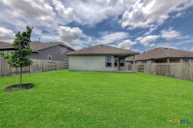 123 Paul Pena Dr, San Marcos, TX 78666 - back of house with a patio area