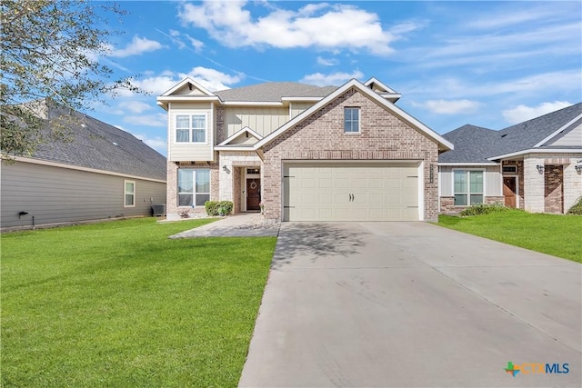 craftsman inspired home with a front lawn, concrete driveway, brick siding, and board and batten siding