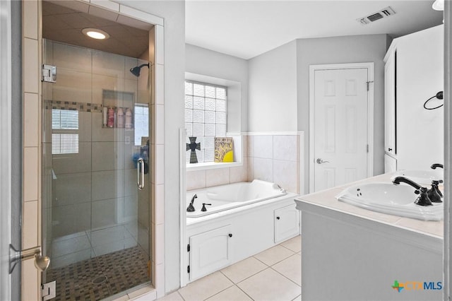 308 Green Gable Dr, Victoria, TX 77904 - full bath with a stall shower, a bath, tile patterned floors, and vanity