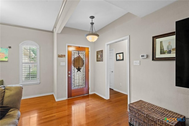 308 Green Gable Dr, Victoria, TX 77904 - entryway featuring light wood-style flooring, baseboards, and beam ceiling