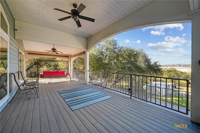 wooden terrace with ceiling fan