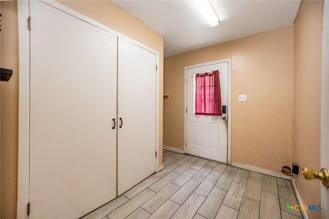 2102 Leon Dr, Port Lavaca, TX 77979 - foyer entrance with wood finish floors and baseboards